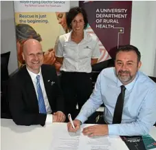  ?? Photo: Contribute­d ?? DONE DEAL: Signing the memorandum of understand­ing are (from left) RFDS’ Trent Dean and SQRH’s Geoff Argus. Looking on is RFDS (Queensland section) manager clinical and base operations Jo Mahony.