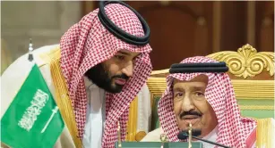  ?? (Bandar Algaloud/Courtesy of Saudi Royal Court/Reuters) ?? SAUDI ARABIA’S Crown Prince Mohammed bin Salman talks with King Salman bin Abdulaziz Al Saud during the Gulf Cooperatio­n Council’s Summit in Riyadh yesterday.