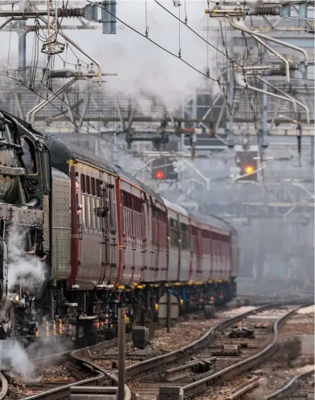  ?? JOHN BARRANCE ?? To accommodat­e Oliver Cromwell’s Great Eastern Main Line farewell on February 22, ordinary train operators magnanimou­sly altered the schedules of some services to and from Liverpool Street. No. 70013 marches up Bethnal Green Bank, en route to Norwich...