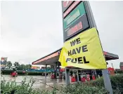  ?? ?? A Texaco petrol station at Newton Heath, Manchester, lets customers know it has fuel