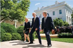  ?? The Associated Press ?? President Joe Biden departs with Swedish Prime Minister Magdalena Andersson, left, and Finnish President Sauli Niinisto, right, after speaking Thursday in the Rose Garden at the White House in Washington.