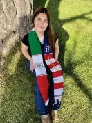  ?? Photograph: Daisy Jasmin Estrada Borja/AP ?? Naomi Peña Villasano with her sash of both the Mexican and American flags.