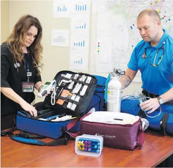  ?? TROY FLEECE ?? Nurse practition­er Kim Lato and paramedic Donovan Ljubic are two of the 30 members of the Seniors House Calls program, which has made more than 3,000 house calls to seniors since the program began in April 2016 in an effort to cut down the number of...