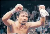  ?? AFP ?? Pacquiao is the only one to win world titles in eight divisions.