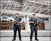  ??  ?? Armed cops will remain on duty at Holyrood