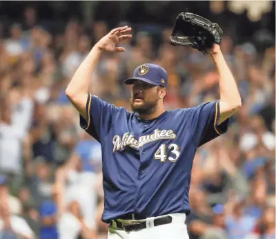  ??  ?? Brewers relief pitcher Matt Albers is 5-3 with a 3.93 earned run average after recording his career-high third save on Saturday.