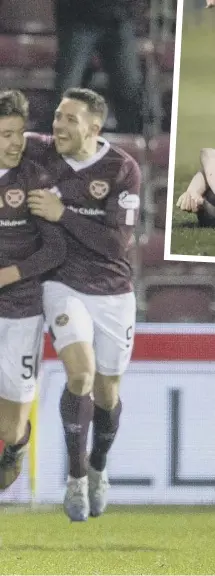  ??  ?? 2 Jubilant Hearts players celebrate Oliver Bozanic’s goal in Saturday night’s Scottish Cup win over Rangers. Above, the victory was marred by yet another injury to defender John Souttar, whose season is over. Right, Greg Stewart played in attack for Rangers but struggled to make an impact.