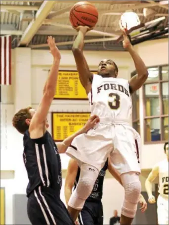  ?? DIGITAL FIRST MEDIA FILE ?? Kharon Randolph hit a pair of big 3-pointers in the fourth quarter as part of a 21-point outing in Haverford School’s 71-66 nonleague win over Phelps School Thursday.