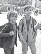  ??  ?? Auggie (Jacob Tremblay, left) makes his first friend at school in Jack Will (Noah Jupe). LIONSGATE ENTERTAINM­ENT