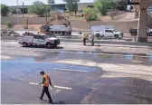  ?? MARK HENLE/THE REPUBLIC ?? Work continues May 9 on repairing a broken water line beneath the Superstiti­on Freeway at McClintock Drive in Tempe. The Superstiti­on Freeway is closed between Interstate 10 and Loop 101.