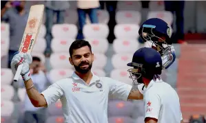  ?? — PTI ?? India’s captain Virat Kohli celebrates his 200 against Bangladesh in Hyderabad on Friday.