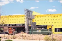  ?? AMY BYRES/RIO RANCHO OBSERVER ?? A new Defined Fitness gym is under constructi­on on Jager Drive in Rio Rancho, with an expected completion date in September.