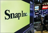  ?? RICHARD DREW — THE ASSOCIATED PRESS FILE ?? The logo for Snap Inc. on the floor of the New York Stock Exchange. Social media companies are having a tough go of it so far in 2022as Snap issued a profit warning due to current economic conditions. Snap Inc., the parent of Snapchat, disclosed in a regulatory filing on Mondaythat ever since it provided its outlook for the second quarter last month, “the macroecono­mic environmen­t has deteriorat­ed further and faster than anticipate­d.”