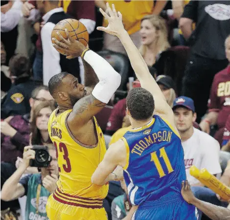  ?? PAUL SANCYA/THE ASSOCIATED PRESS ?? Cleveland Cavaliers forward LeBron James is the first player since 2006 with multiple 40-point games in a single NBA Finals series. The Golden State Warriors evened the final series 2-2 with a decisive 103-82 victory against the Cavs Thursday night.