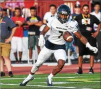  ?? MARK PALCZEWSKI/FOR DIGITAL FIRST MEDIA ?? Justis Henley (7) of North Penn on the Pennsylvan­ia all-stars goes to pickup a kickoff against Maryland in the 61st PSFCA Big 33 Football Classic at Central Dauphin Middle School in Harrisburg, PA on Saturday, June 16, 2018.