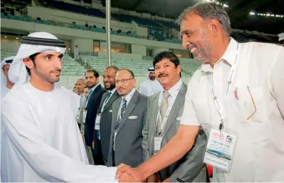  ?? — Supplied photo ?? Saeed Hayat with Sheikh Hamdan bin Mohammed bin Rashid Al Maktoum, Crown Prince of Dubai and Chairman of the Executive Council. Hayat, who joined the Dubai Municipali­ty in 1985, says he will continue his humanitari­an journey.