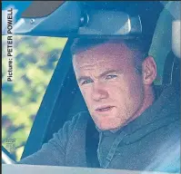  ??  ?? GRIM-FACED: Rooney leaves training yesterday