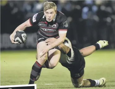  ??  ?? Nathan Fowles drives Edinburgh forward in last night’s Myreside contest, while, left, Jason Tovey congratula­tes Stuart Mcinally on his first-half try. It turned out to be the hosts’ only try of the match.