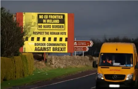  ??  ?? A road sign on the border campaignin­g against the impact of Brexit.