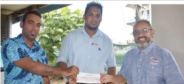  ??  ?? From left: Street Demons assistant president Ronald Atish Chand, president Sharoof Shah and Saint Minas Childrens Home Trustee George Saub receiving the cheque in Martintar, Nadi, on April 24, 2017.