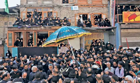  ?? DANISH ISMAIL/REUTERS ?? A MUHARRAM PROCESSION in Srinagar on August 19. The police thrashed several journalist­s who were covering the Muharram procession­s in the city.