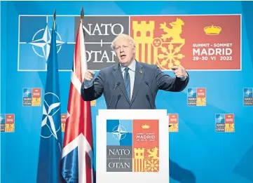 ?? ?? SPENDING: Boris Johnson holds a news conference at the end of the Nato summit.