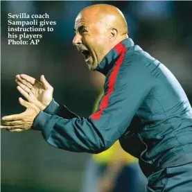  ??  ?? Sevilla coach Sampaoli gives instructio­ns to his players Photo: AP