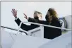  ?? JACQUELYN MARTIN — THE ASSOCIATED PRESS ?? ice President Kamala Harris and her husband, Doug Emhoff, wave as they board Air Force Two at Andrews Air Force Base, Md., Monday en route to Las egas.