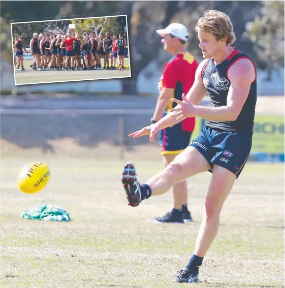  ?? Picture: MIKE BATTERHAM ?? Adelaide star Rory Sloane training at Ord Minnett Oval yesterday on the Gold Coast, where the club (inset) was taking an AFL finals break.