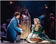  ??  ?? JoshuaGros­so asMarius, Phoenix Best as Eponine and Jillian Butler as Cosette in the national tour of “Les Miserables.”