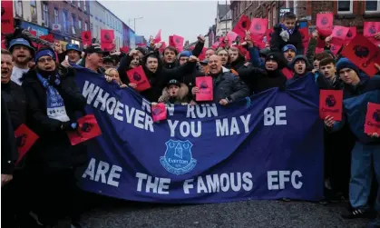  ?? Photograph: Tom Jenkins/The Guardian ?? Everton supporters protest against the club’s 10-point Premier League deduction before last Sunday’s game against Manchester United.