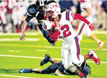  ?? Eddy Matchette / For the Chronicle ?? Lamar running back Caleb Jolivette (22) and the Texans face Eisenhower in the area round of the UIL Class 6A playoffs Saturday.