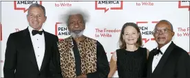  ?? ?? Corporate honoree Robert Iger, left, playwright Wole Soyinka, actress Jodie Foster and Pen/audible Literary Service Award recipient Dr. Henry Louis Gates at the 2021PEN America Literary Gala at the American Museum of Natural History on Tuesday in New York.