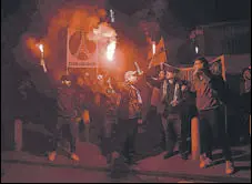  ?? GETTY IMAGES ?? PSG fans light flares and smoke bombs after the UEFA Women's Champions League match between Chelsea and PSG.