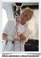  ??  ?? Alison administer­s a blood transfusio­n on the evacuation boat from Misrata