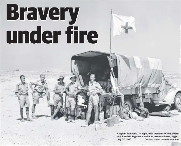  ?? Picture: AUSTRALIAN WAR MEMORIAL ?? Chaplain Tom Gard, far right, with members of the 2/ 43rd AIF Battalion Regimental Aid Post, western desert, Egypt, July 30, 1942.