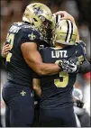  ?? SEAN GARDNER / GETTY IMAGES ?? The New Orleans Saints’ Wil Lutz celebrates after kicking a game-winning field goal Sunday against the Carolina Panthers at the Mercedes-Benz Superdome in New Orleans.