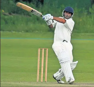  ??  ?? Howzat Qasim Sheikh in action (above) and at East Kilbride Cricket Club (inset)