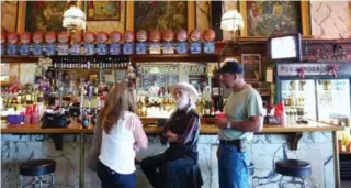  ?? EMMA YARDLEY ?? The Ponderosa Saloon in Virginia City, Nev., is a gathering place that also offers mine tours, with the entrance near the bar.