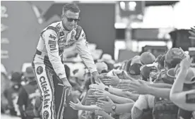  ?? JASEN VINLOVE/USA TODAY SPORTS ?? “The racetrack will always be special, obviously, being my first win, reliving those memories,” said NASCAR Cup driver A.J. Allmending­er, who first won at Watkins Glen three years ago.