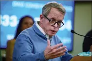  ?? DORAL CHENOWETH — THE COLUMBUS DISPATCH VIA AP, FILE ?? Ohio Gov. Mike DeWine speaks March 14 at a coronaviru­s news conference at the Ohio Statehouse in Columbus.