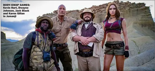  ??  ?? BODY-SWAP GAMES: Kevin Hart, Dwayne Johnson, Jack Black and Karen Gillan in Jumanji