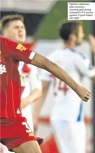  ??  ?? Fabinho celebrates after scoring a stunning goal during Liverpool’s 4-0 victory against Crystal Palace last night