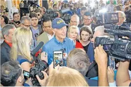  ?? RED HUBER/STAFF PHOTOGRAPH­ER ?? Gov. Rick Scott, center, announced Monday that he is running for U.S. Senate, during a campaign rally at ODC Constructi­on in Orlando. In challengin­g three-term incumbent Democratic Sen. Bill Nelson, the governor decried “career politician­s,” called for...