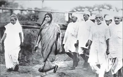 ?? GAMMA-KEYSTONE VIA GETTY IMAGES ?? 13 February is political activist and poet Sarojini Naidu’s 142nd birth anniversar­y. Here, Naidu (centre) is pictured during the salt march with Kasturba Gandhi (left) and other freedom fighters.
