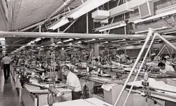  ?? NASA via the New York Times ?? Engineers work at the North American Aviation site in Downey, Calif., in the mid-1960s.