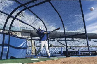  ?? NATHAN DENETTE
THE CANADIAN PRESS ?? Toronto Blue Jays catcher Danny Jansen takes part in batting practice during spring training Thursday in Dunedin. Position players don’t have to report to Toronto’s training complex in Florida until Monday.