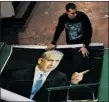  ?? ODED BALILTY/ THE ASSOCIATED PRESS ?? A print house employee works on an election campaign billboard of Likud Party leader Benjamin Netanyahu in Petah Tikva.