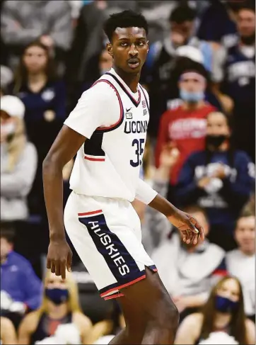  ?? Jessica Hill / Associated Press ?? UConn’s Samson Johnson fully intends on being a big factor for the Huskies next season, and is putting in the work this summer to ensure that.