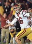  ?? KEVIN CARDEN, USC ATHLETICS ?? Chase McGrath, left, celebrates his winning kick Saturday. He and holder Wyatt Schmidt (46) are walk-ons.